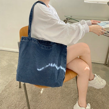 Elevate Your Outfit with Our Chic and Functional Denim Shoulder Bag