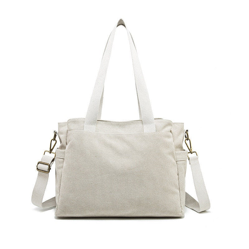 Customizable Comfort: Adjustable Strap Canvas Bag