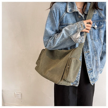 Stay Organized On-the-Go with Our Canvas Crossbody Bag