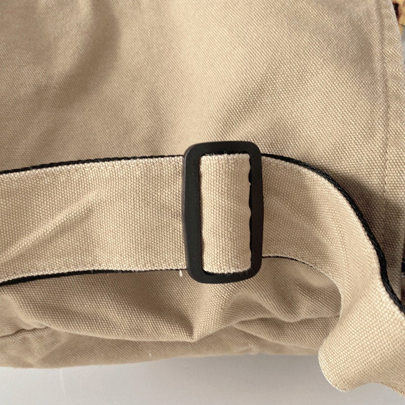 Stay Secure and Organized with Our Lockable and Detachable Canvas Crossbody Bag Pockets